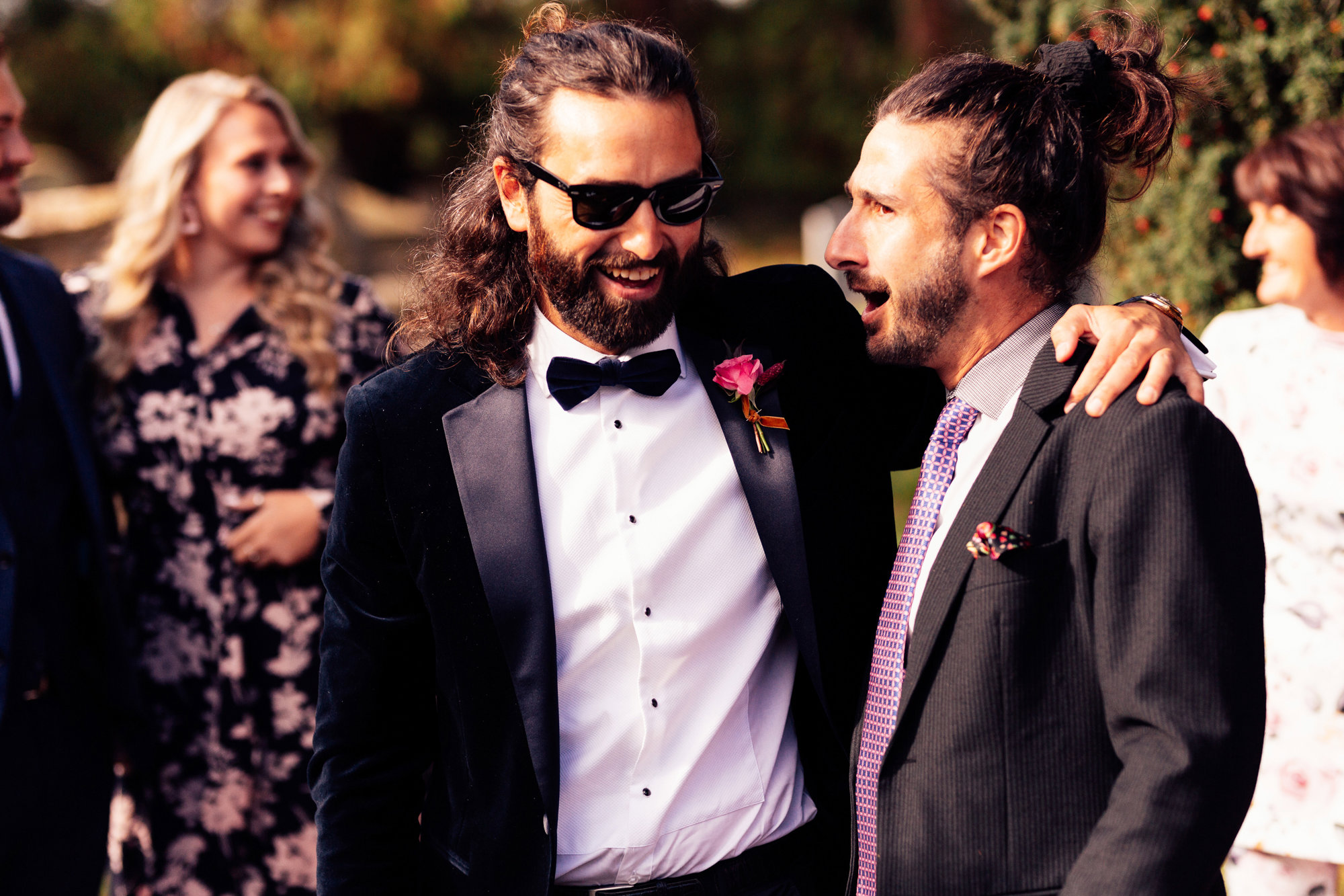 cool groom outside wedding ceremony