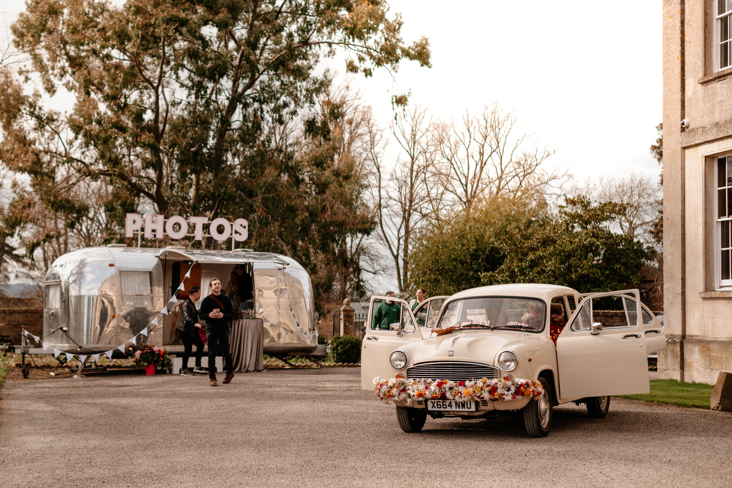 Front of house inspiration with silver trailer photobooth and kushicars's