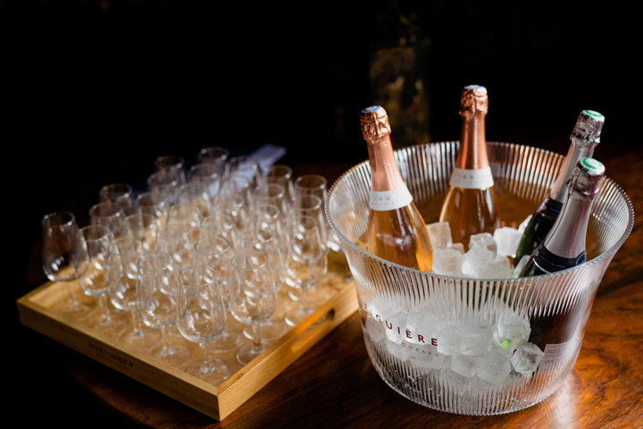 Wine cooling for guests to sample at a wedding fair at elmore court with sommelier on hand to answer questions