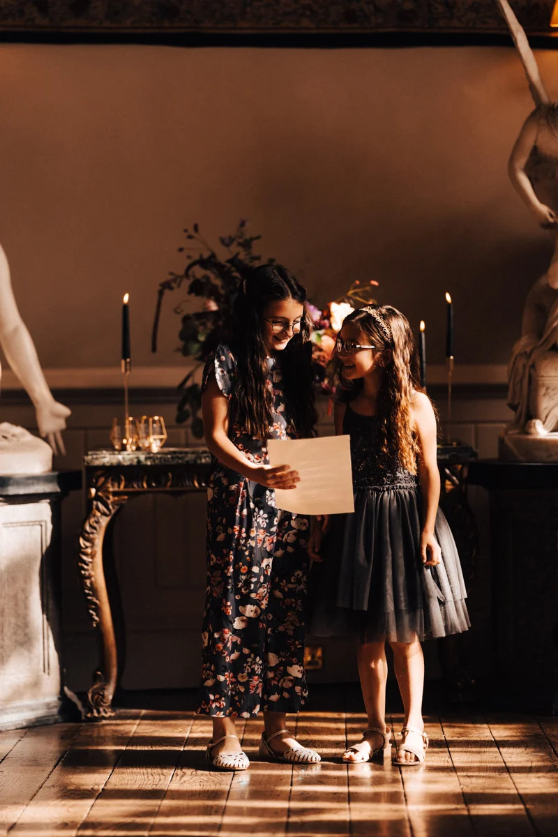 Children taking part in readings during wedding ceremony at a stately home in gloucester