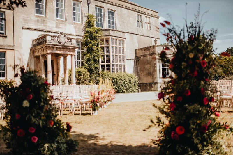 Beautiful outdoor wedding ceremony in summer at Elmore Court