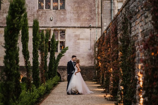 Magical candlelit wedding reception in sustainable venue in the cotswolds