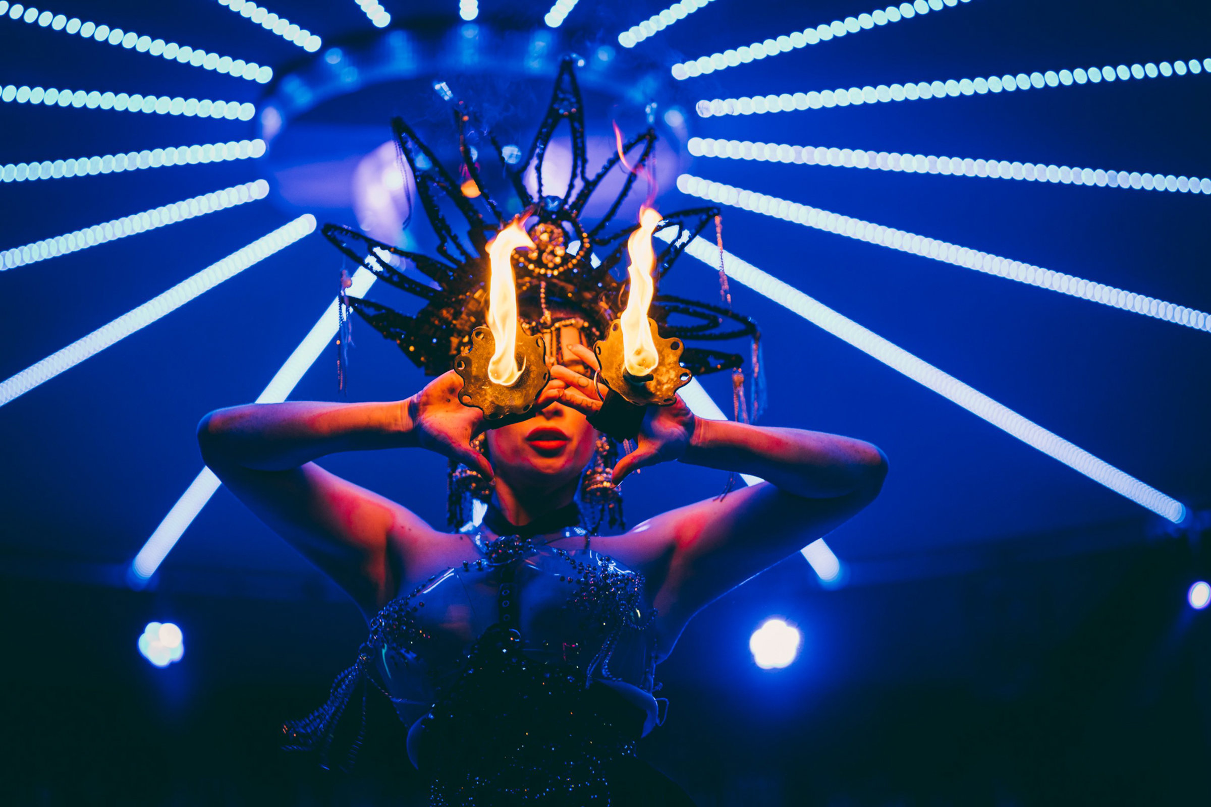 Burlesque fire performer entertainment for special Christmas party at elmore court wedding venue