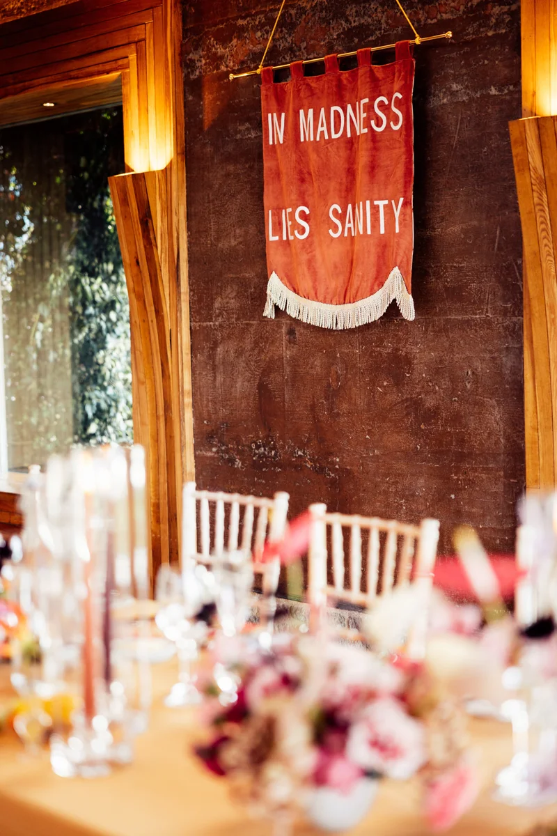 Colourful wedding reception decor and retro stationery for party wedding in Gloucester