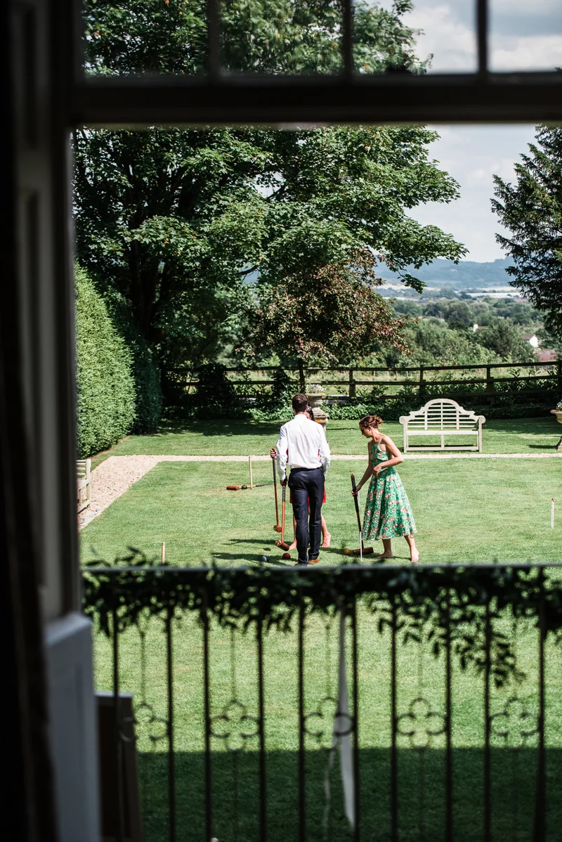 Guests playing Garden games at an outdoor wedding