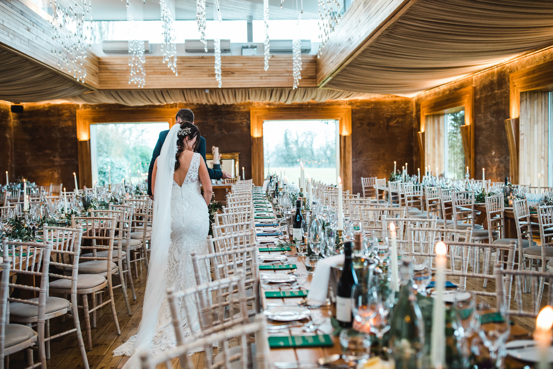 Big wedding reception styled ready to sit down for dinner