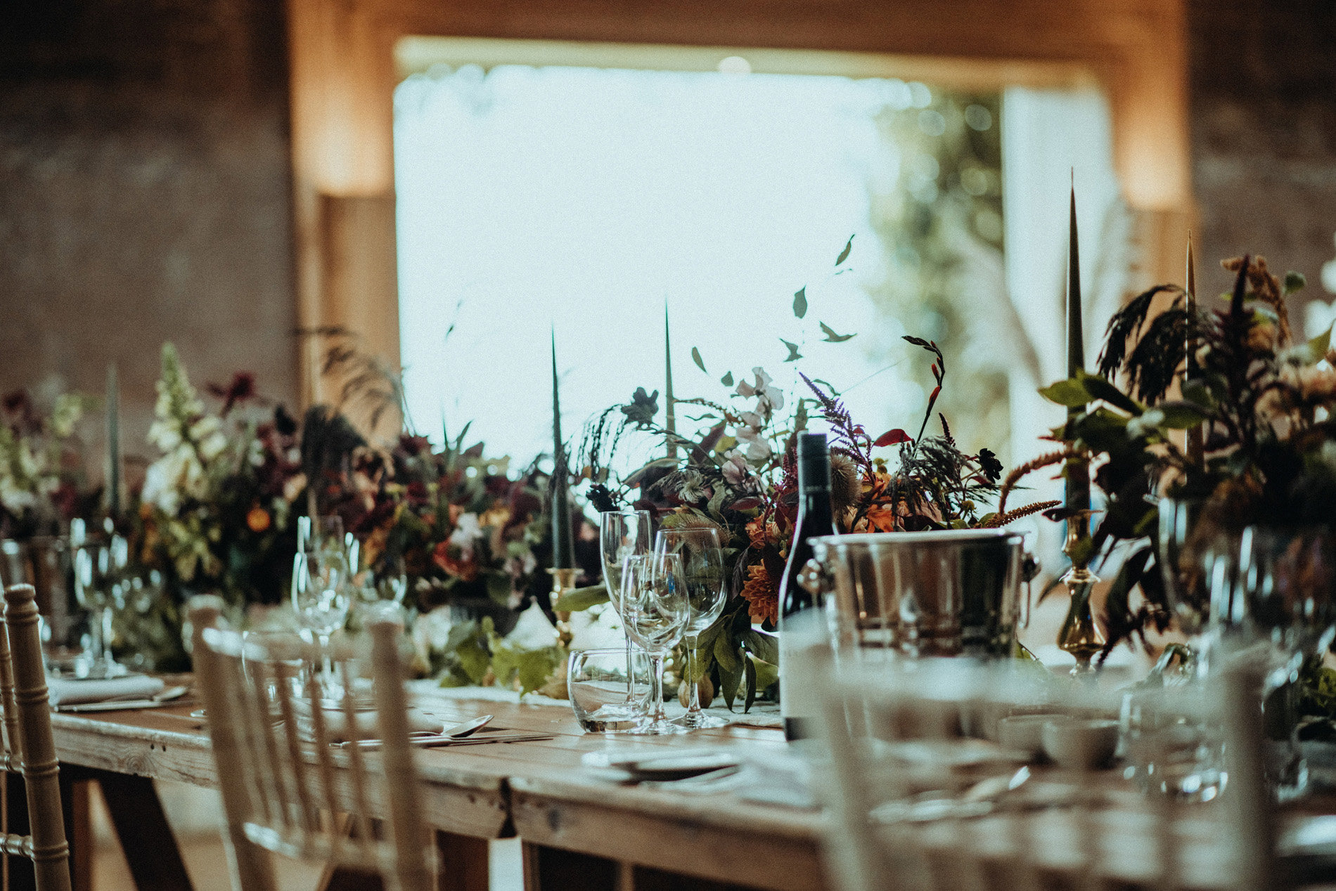 Dark wedding florals with a rustic feel
