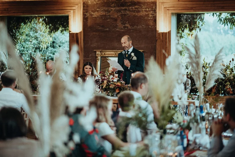 Rustic romantic wedding reception in rammed earth eco venue