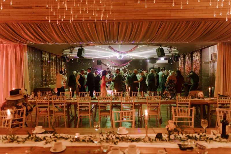 Party wedding venue with cool lighting and guests dancing and having fun with funktion one soundsystem