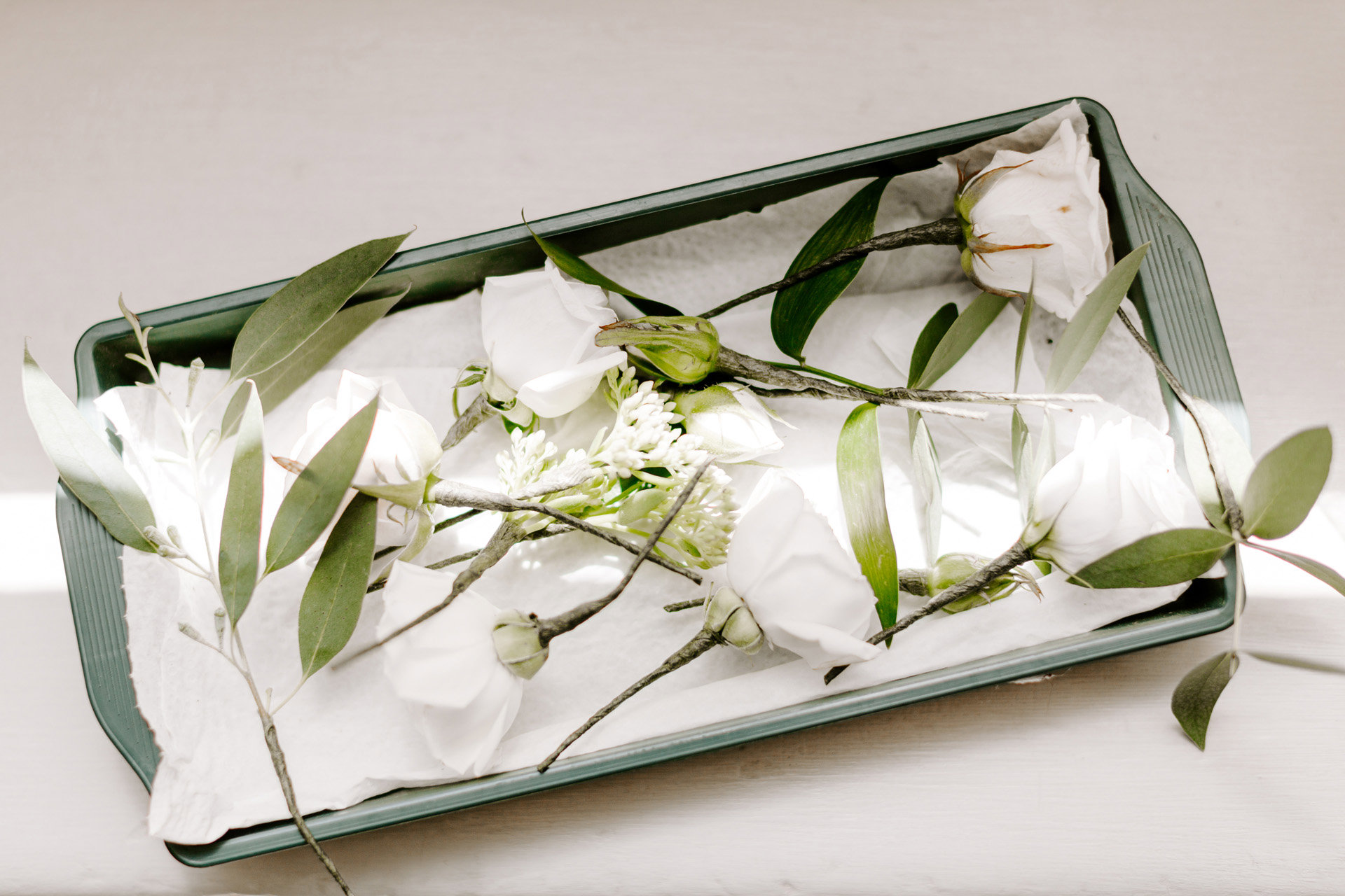 white wedding roses in a box