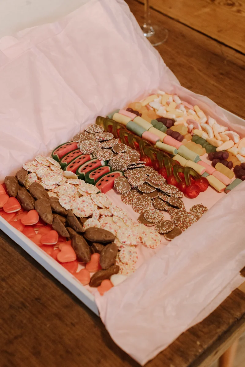 Box of sweeties for a pretty pink wedding with a vintage tea party twist
