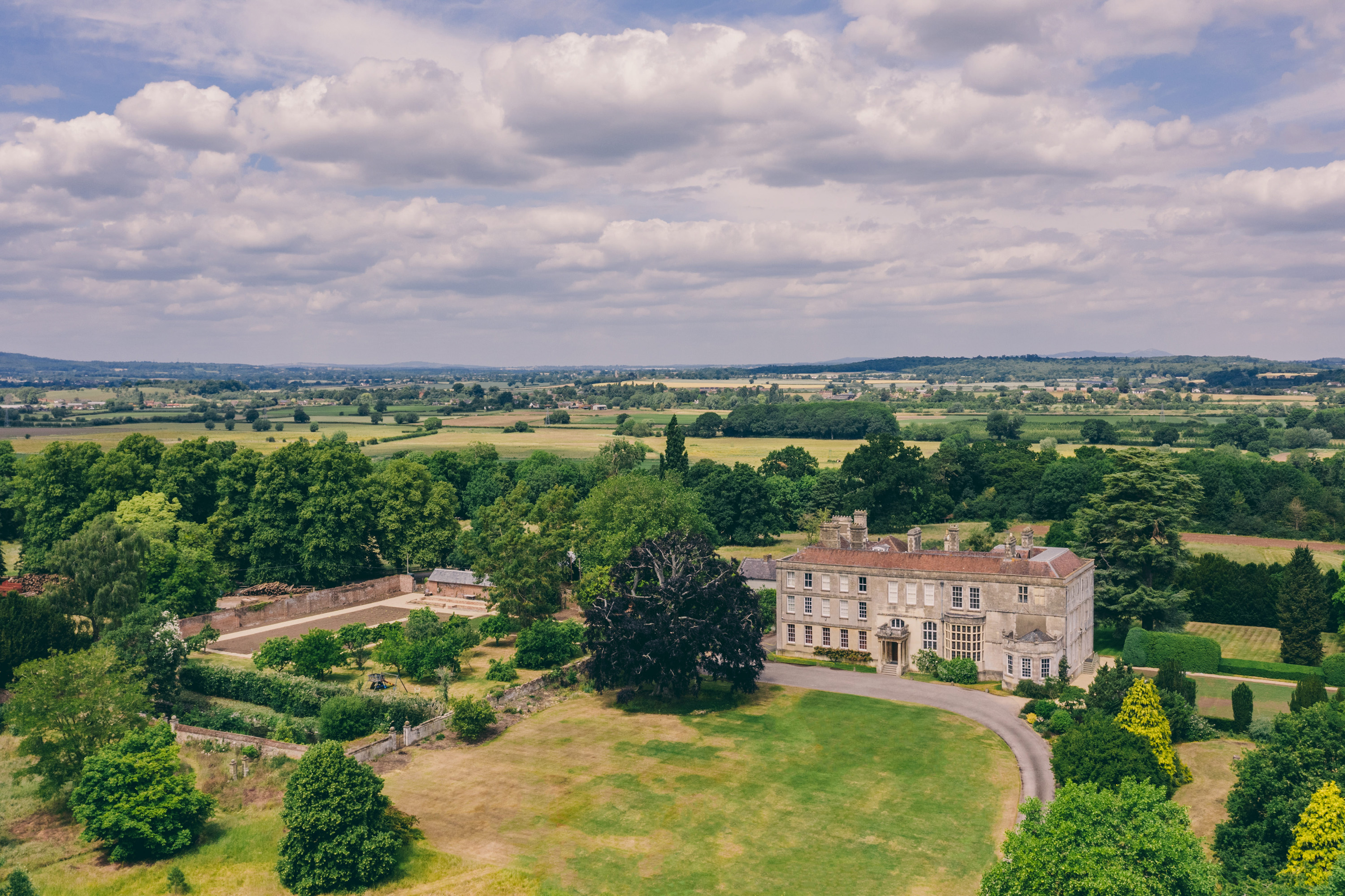 Sustainable wedding venue elmore court and walled garden from above