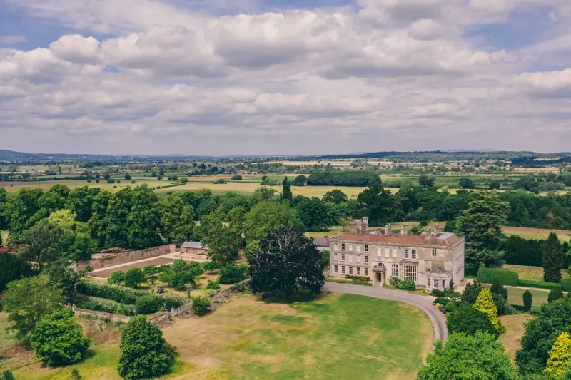 Sustainable wedding venue elmore court and walled garden from above