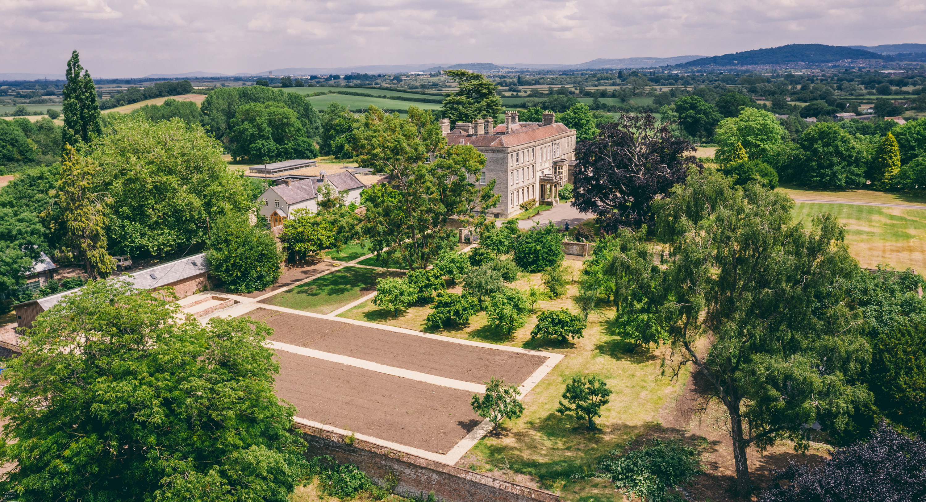 Newly revived Walled garden at elmore court from above. Soon to produce organic food for weddings