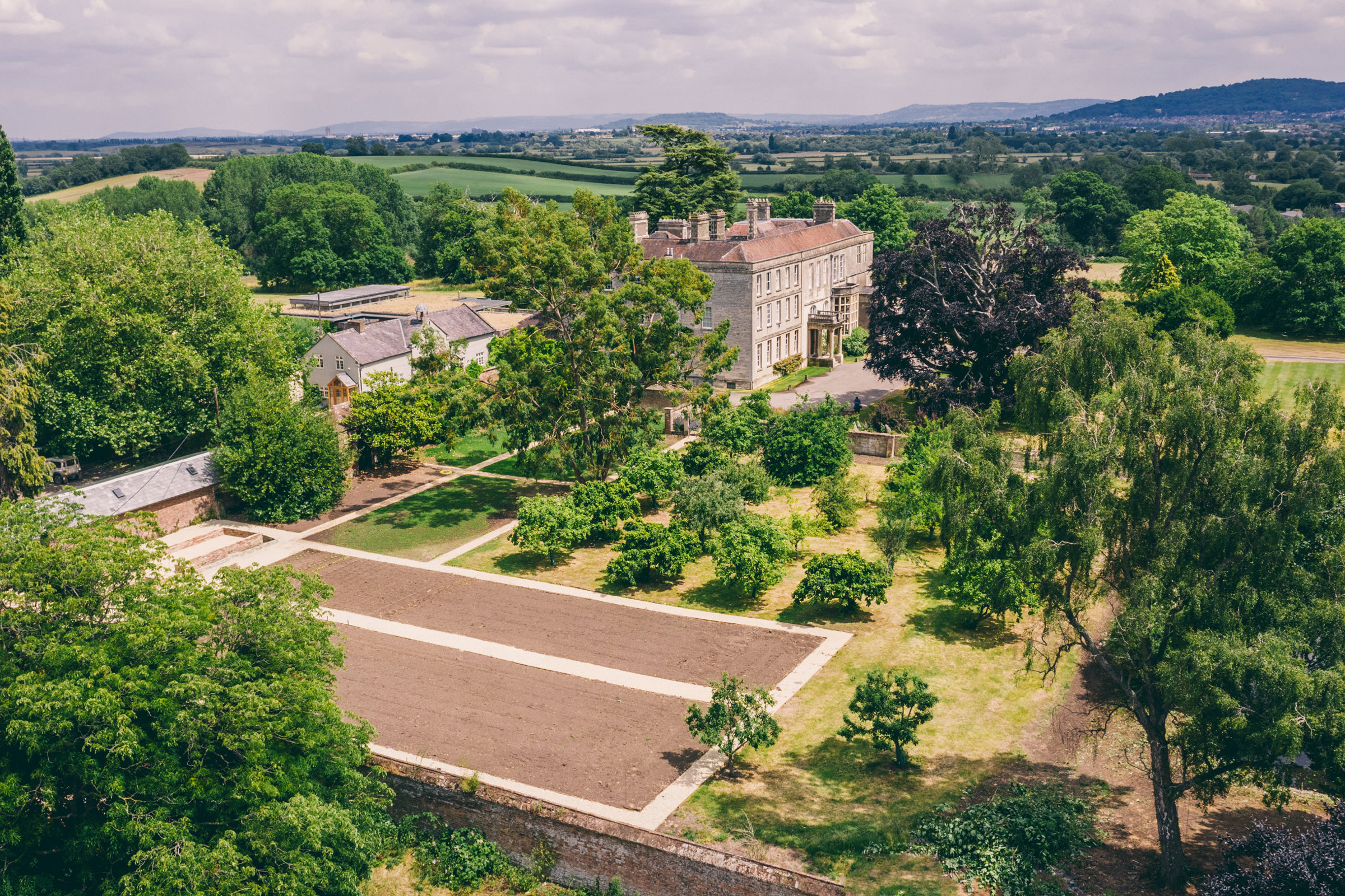 Newly revived Walled garden at elmore court from above. Soon to produce organic food for weddings
