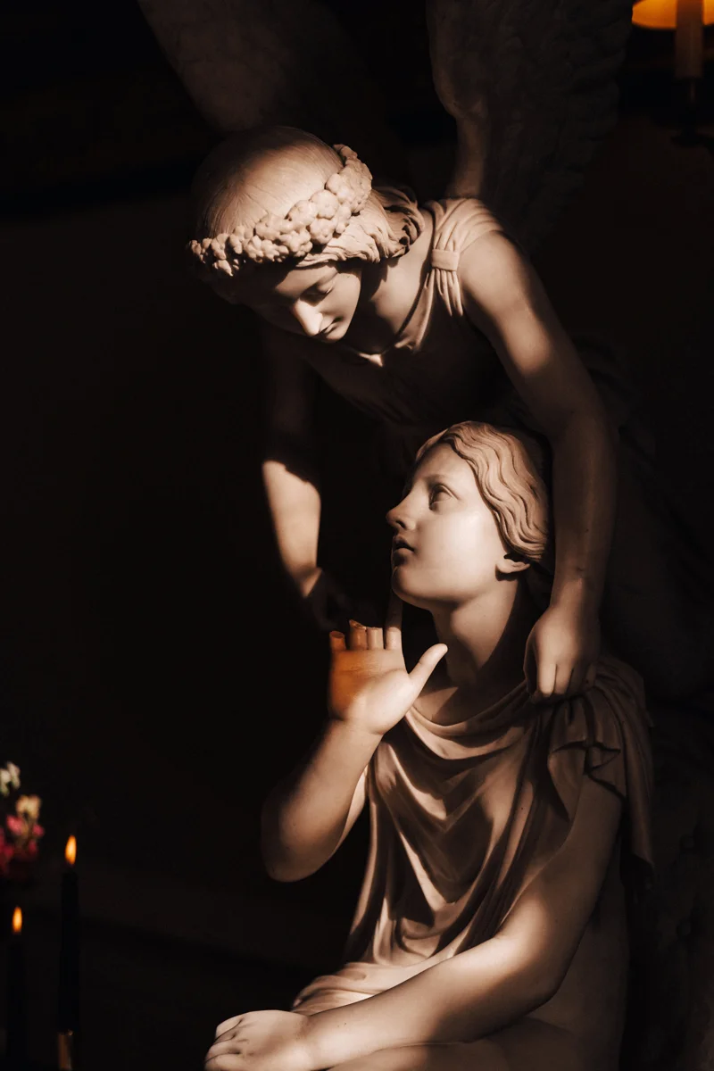 Angel statues and Autumn wedding ideas at a dark wedding venue in the cotswolds countryside