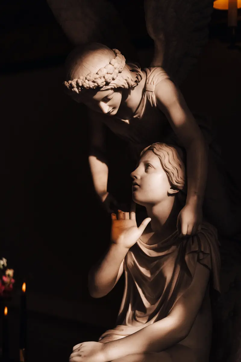 Angel statues and Autumn wedding ideas at a dark wedding venue in the cotswolds countryside