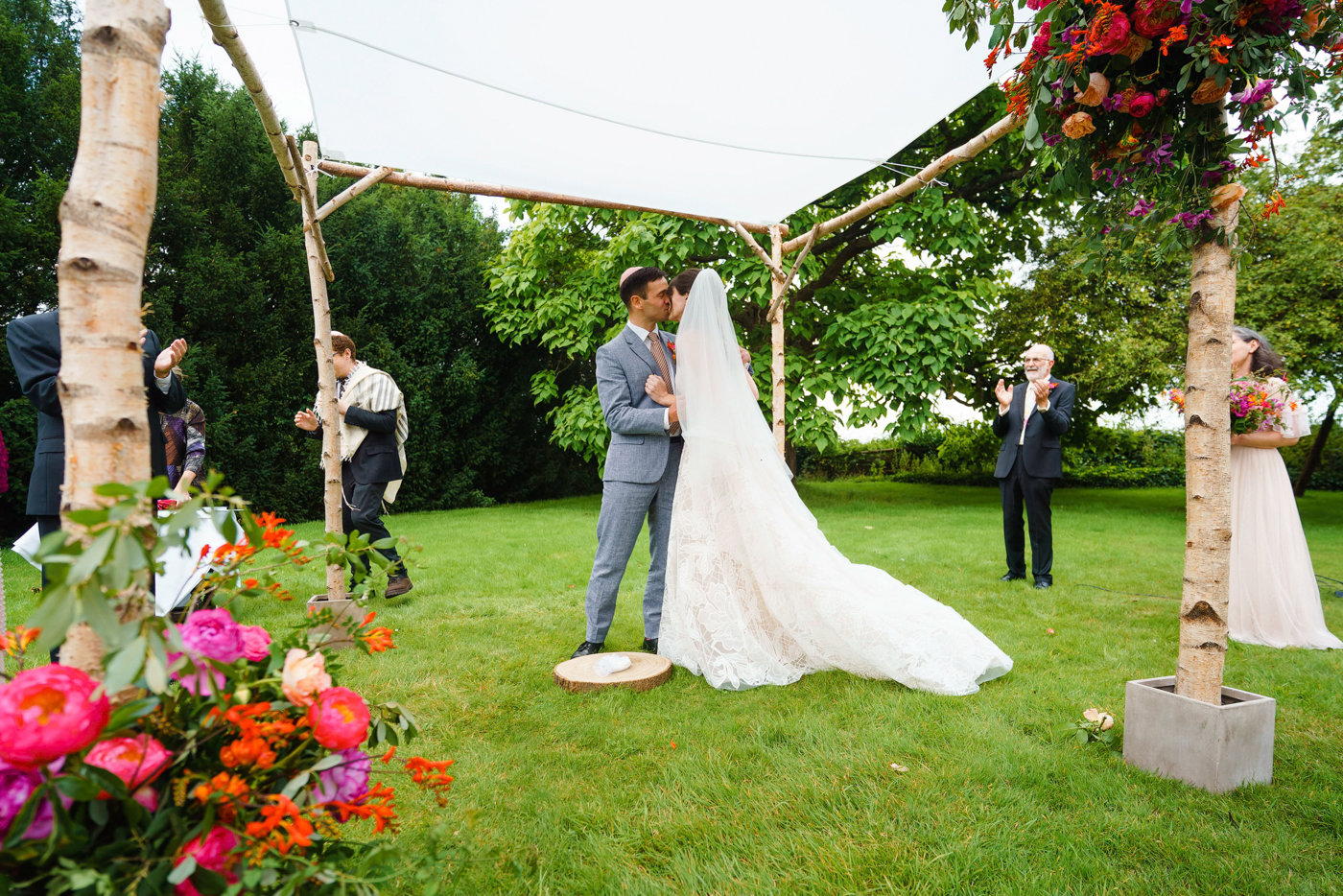 Bride Groom Kiss Under Chuppah