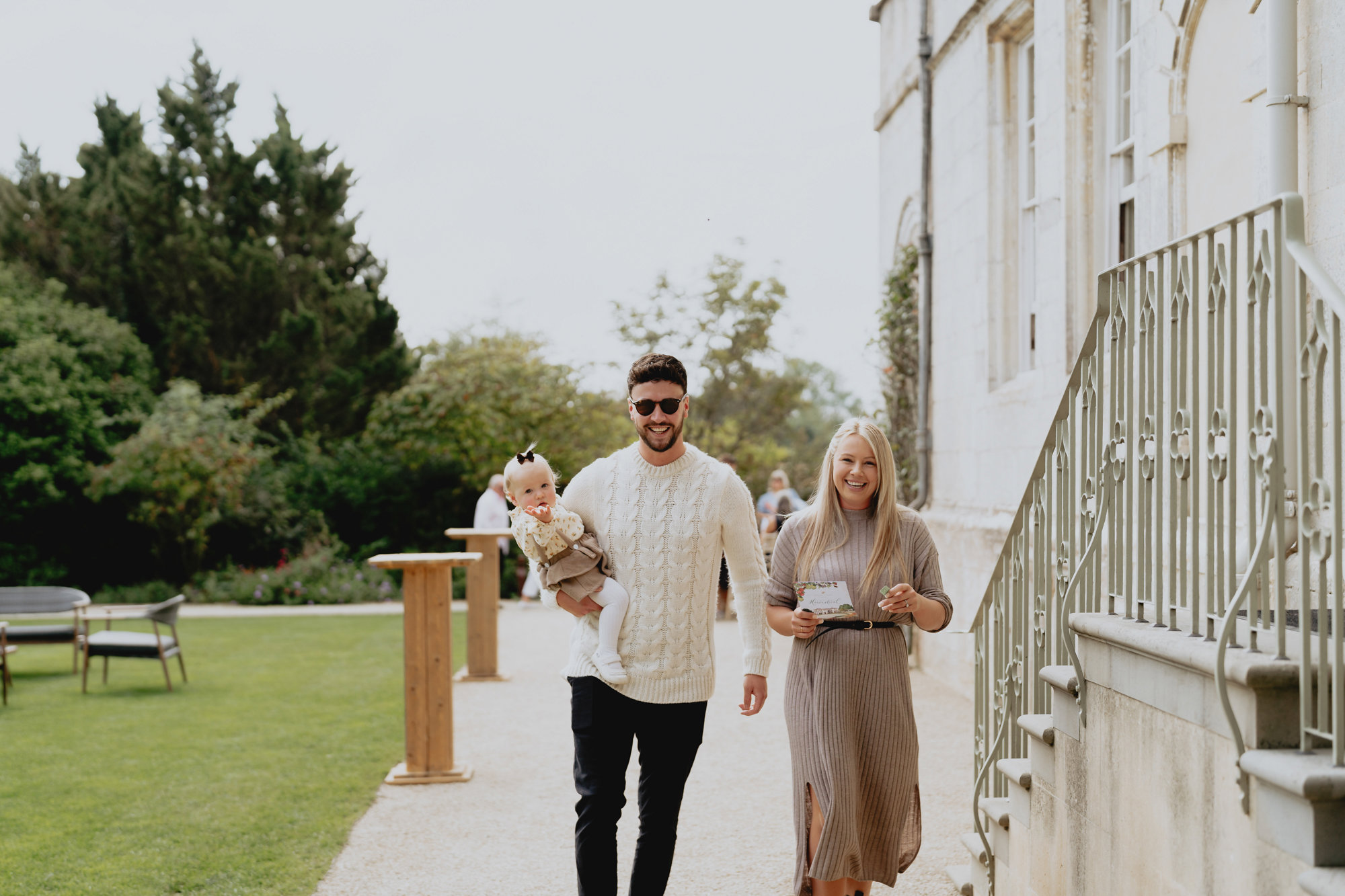 Wedding fair guests with baby at elmore court