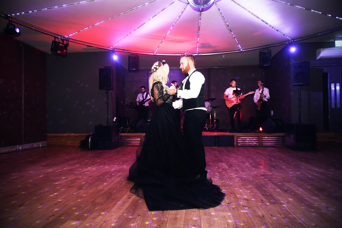 Halloween themed first dance to mash up of I put a spell on you and Bewitched in the style of Hocus Pocus with bride in black wedding dress