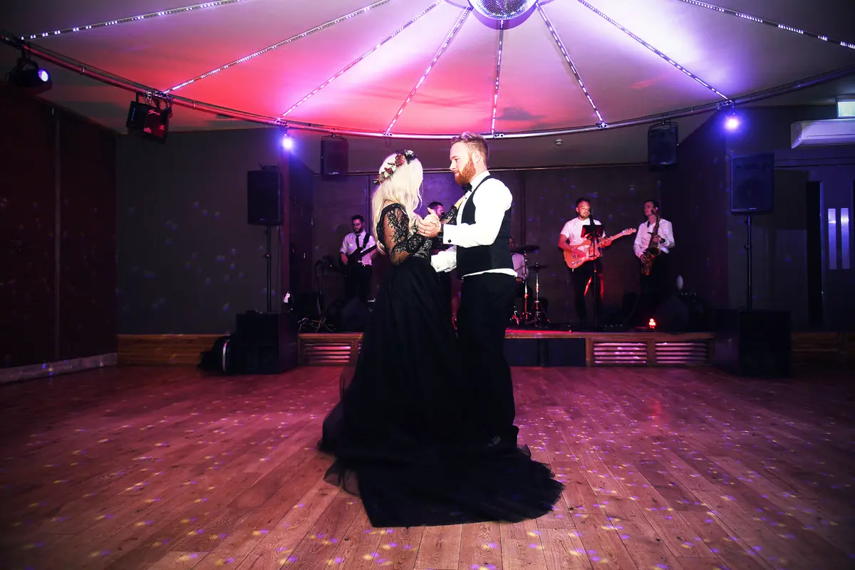 Halloween themed first dance to mash up of I put a spell on you and Bewitched in the style of Hocus Pocus with bride in black wedding dress
