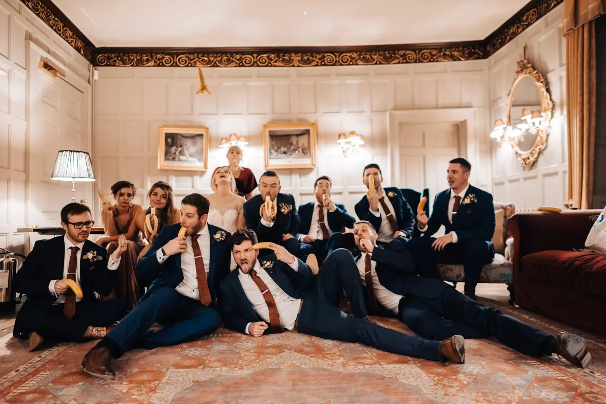 Fun indoor group shot wedding photography, when you can't go outside, get creative