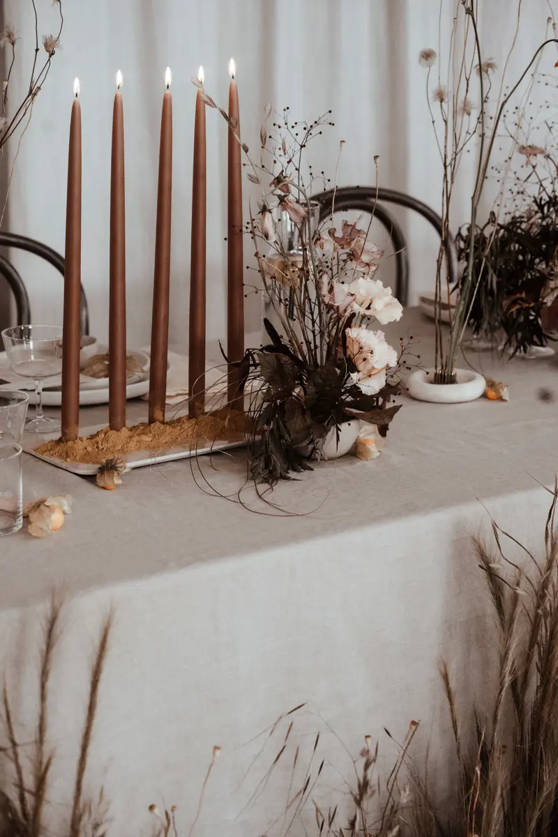 Eco wedding reception with hand dipped candles and natural details for decoration