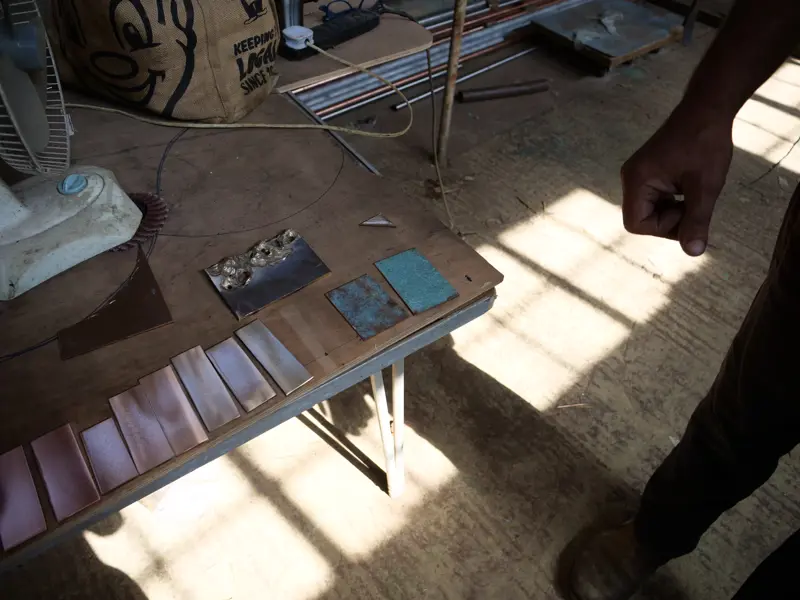 Copper for sculpture in a line at Giles Rayner's Cotswolds studio near the Elmore Court country estate