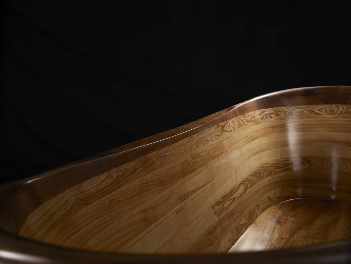 Walnut Bath Rim Detail Against Black Finalmed Jpeg